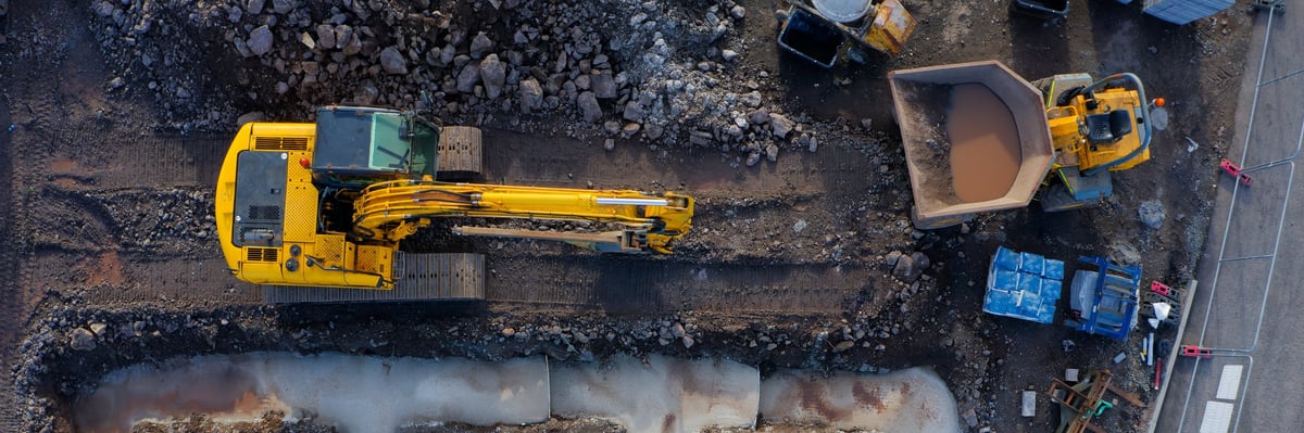 Aerial view of a construction site with materials and equipment